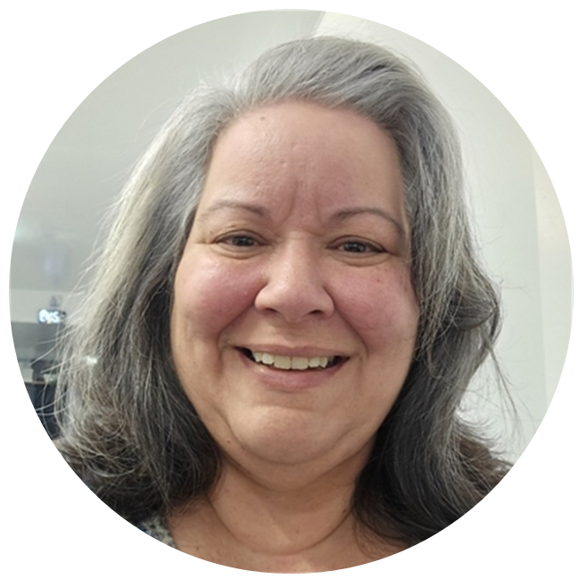 Professional woman with long gray hair
