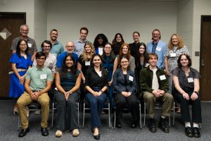 Psychology students present one slide of their research to the Psychology Advisory Board.